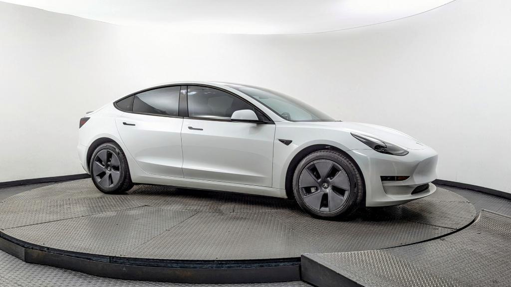 used 2023 Tesla Model 3 car, priced at $22,499