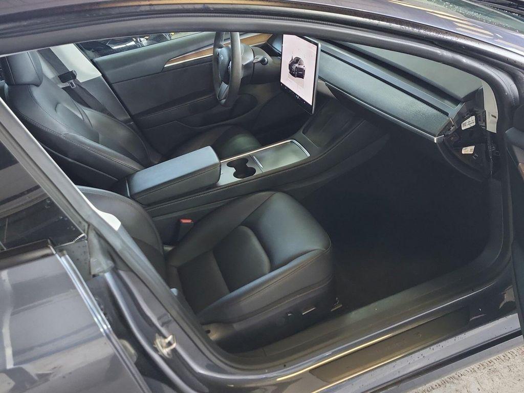 used 2023 Tesla Model 3 car, priced at $25,499