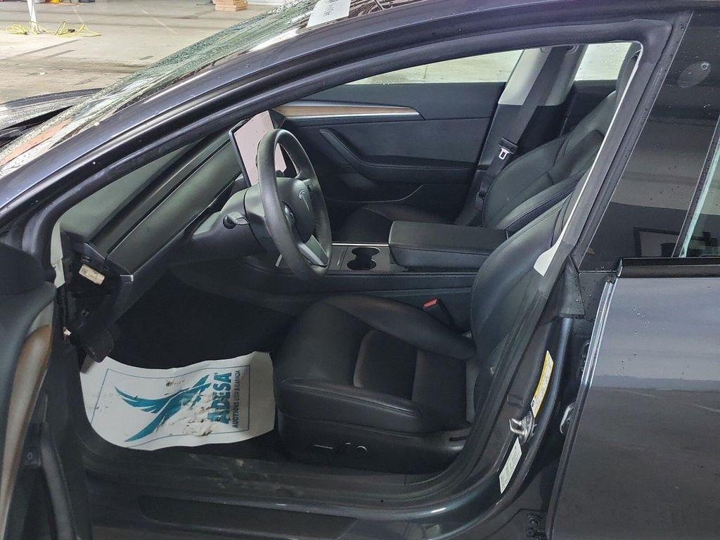 used 2023 Tesla Model 3 car, priced at $25,499