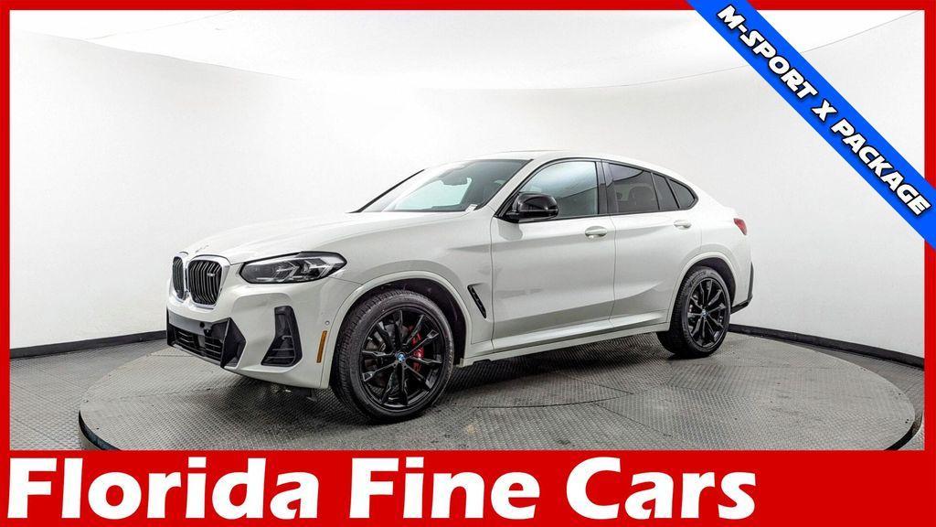 used 2022 BMW X4 car, priced at $30,499