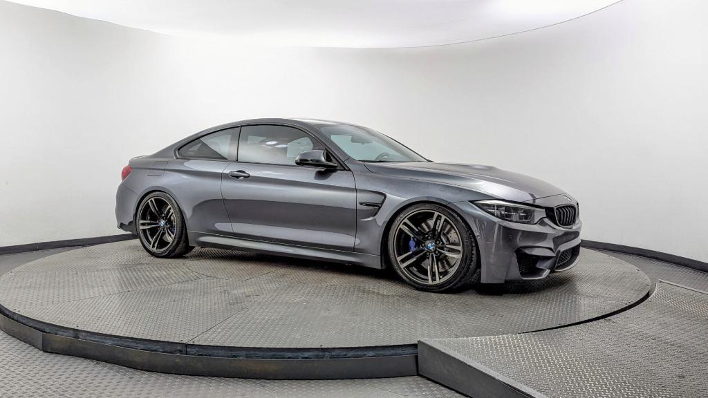 used 2018 BMW M4 car, priced at $37,999