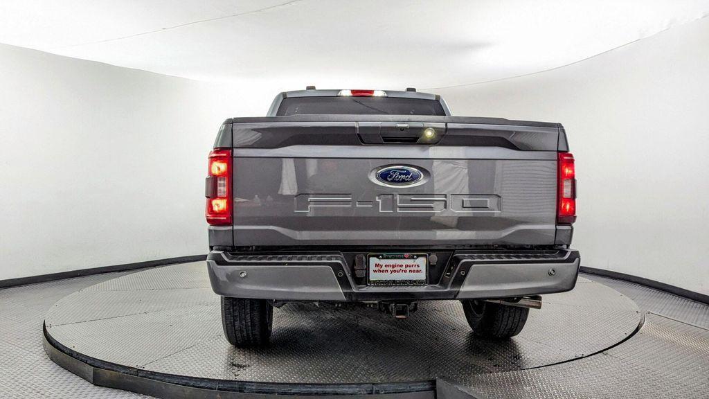 used 2023 Ford F-150 car, priced at $30,199