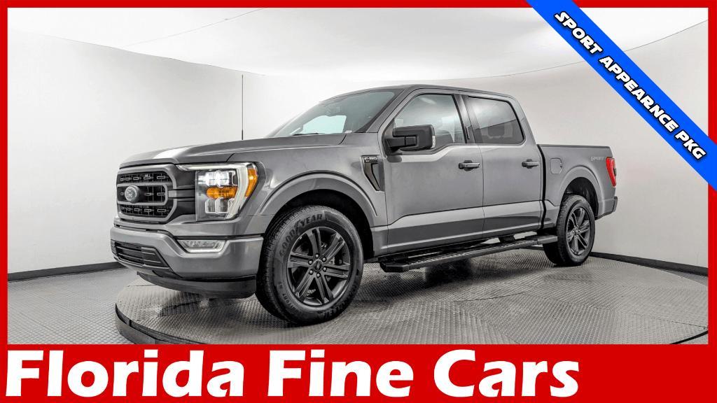 used 2023 Ford F-150 car, priced at $30,199