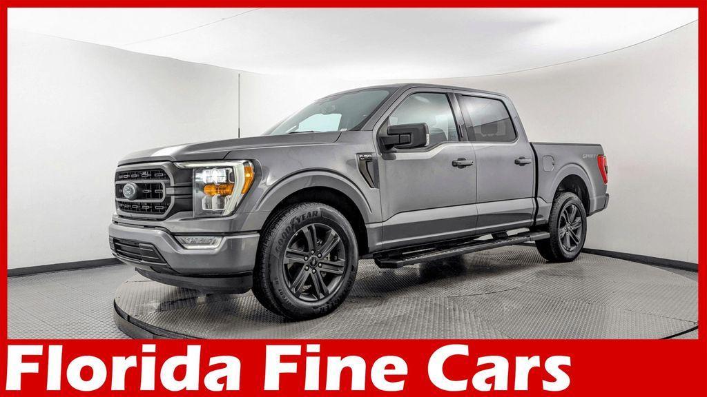 used 2023 Ford F-150 car, priced at $30,199