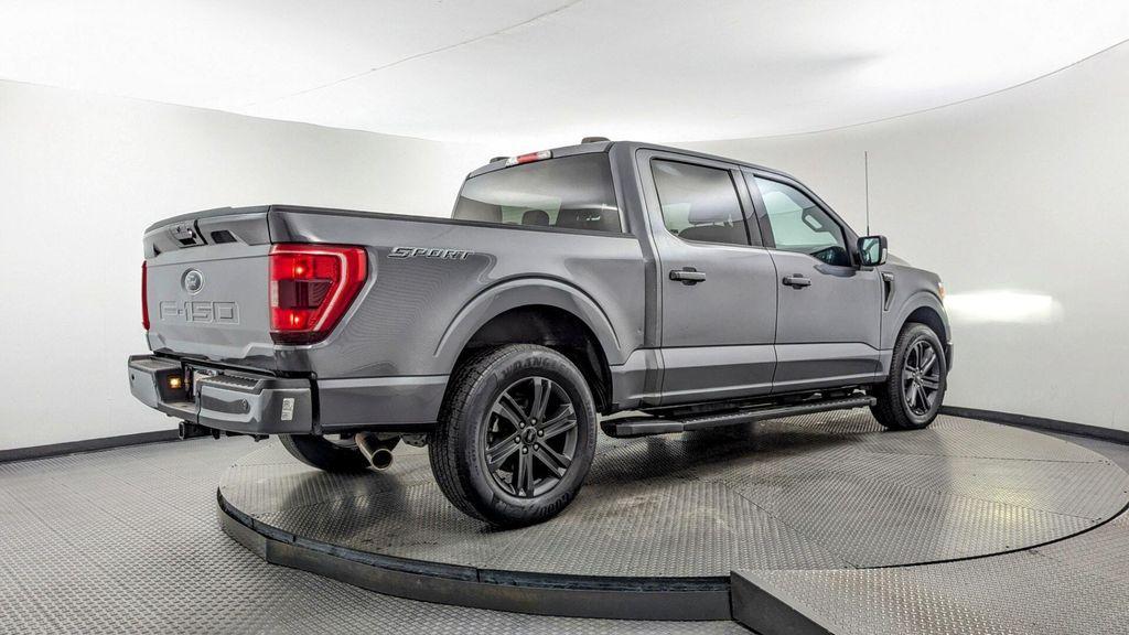 used 2023 Ford F-150 car, priced at $30,199