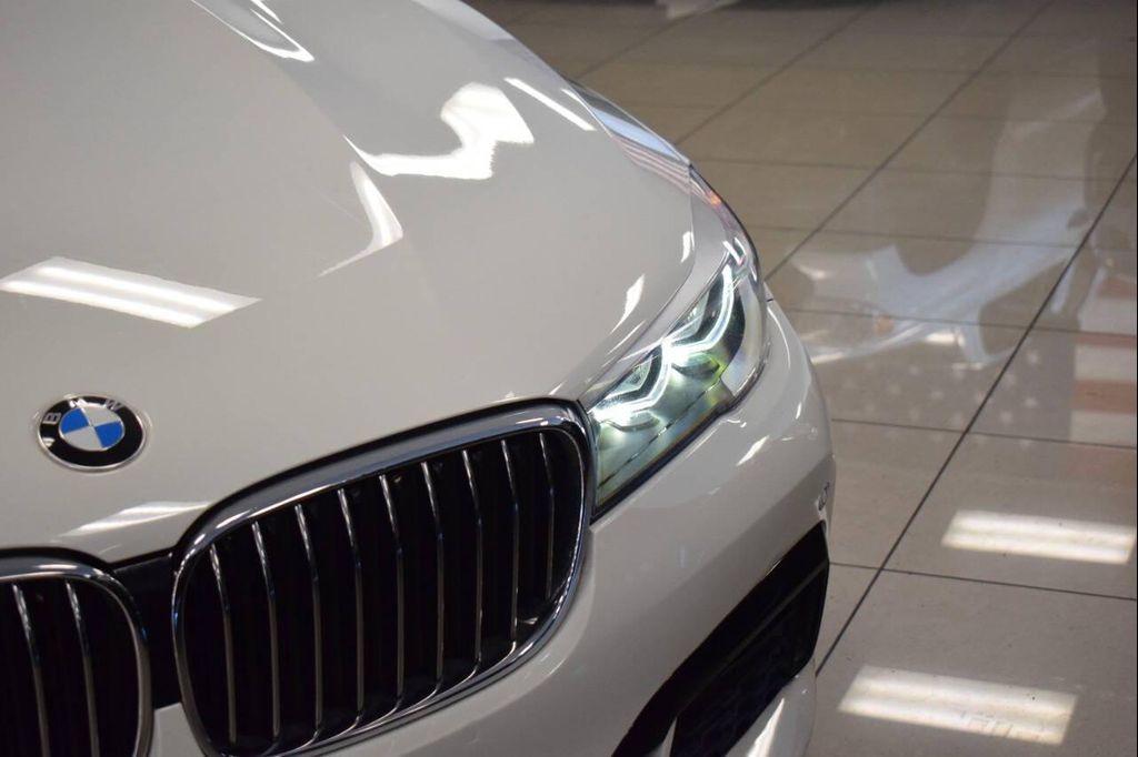 used 2016 BMW 740 car, priced at $22,777