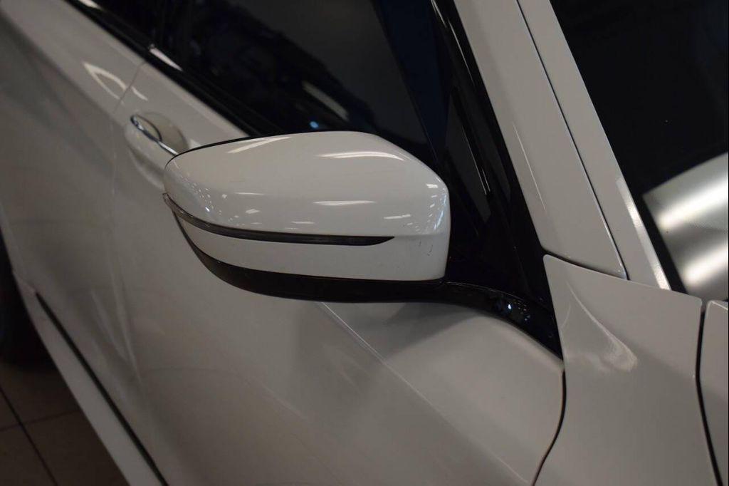 used 2016 BMW 740 car, priced at $22,777