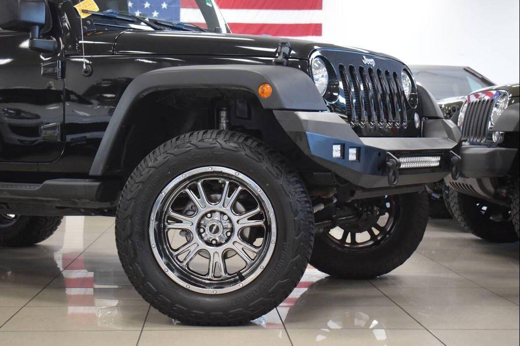 used 2015 Jeep Wrangler Unlimited car, priced at $20,777