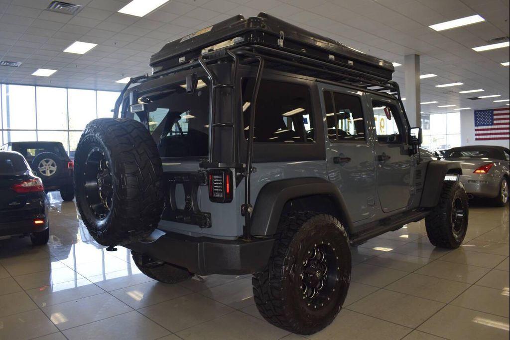 used 2015 Jeep Wrangler Unlimited car, priced at $26,777