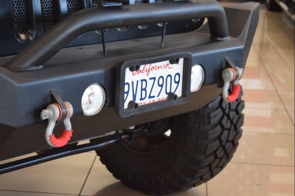 used 2014 Jeep Wrangler Unlimited car, priced at $23,997