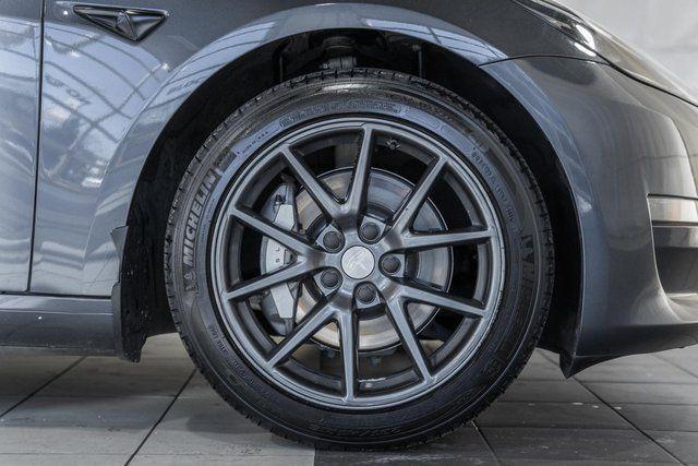 used 2023 Tesla Model 3 car, priced at $17,500