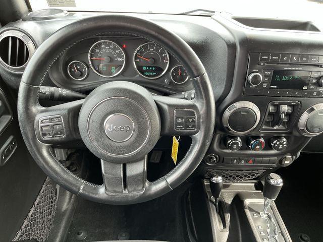 used 2015 Jeep Wrangler Unlimited car, priced at $15,988