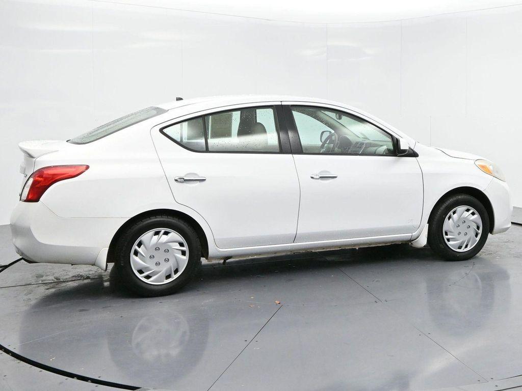 used 2014 Nissan Versa car, priced at $4,700