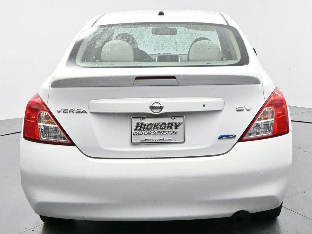 used 2014 Nissan Versa car, priced at $4,700