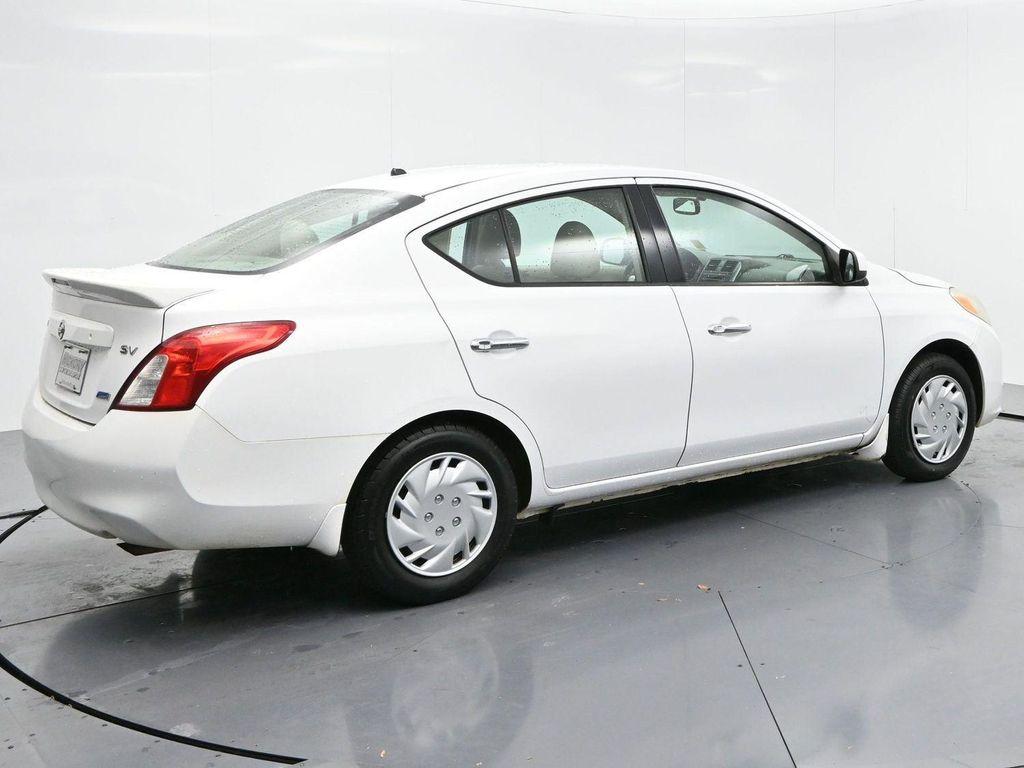 used 2014 Nissan Versa car, priced at $4,700