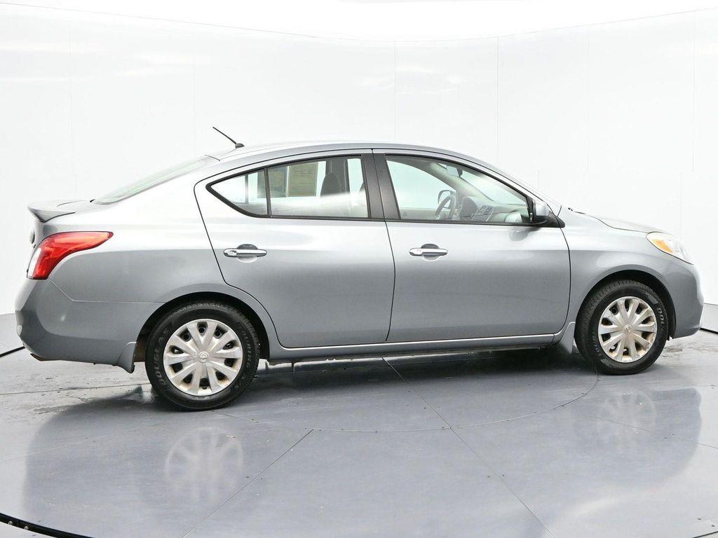 used 2013 Nissan Versa car, priced at $7,500