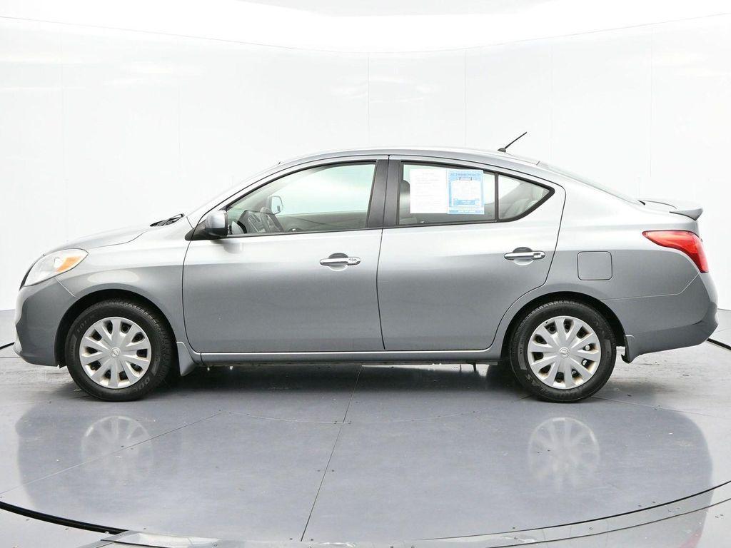 used 2013 Nissan Versa car, priced at $7,500