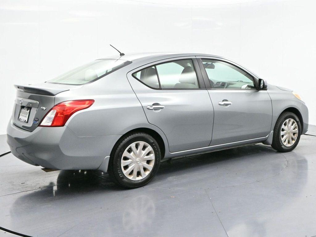 used 2013 Nissan Versa car, priced at $7,500