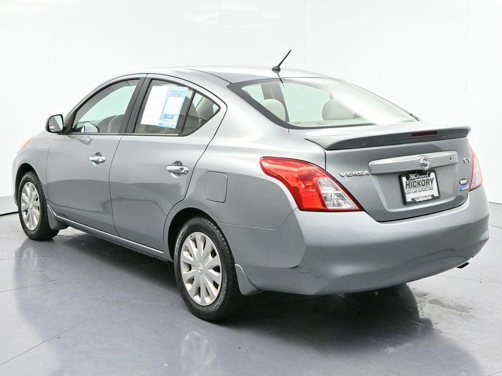 used 2013 Nissan Versa car, priced at $7,500