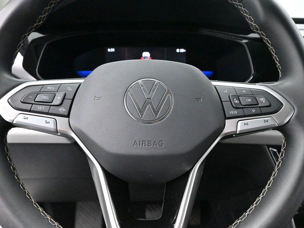 used 2023 Volkswagen Taos car, priced at $19,500