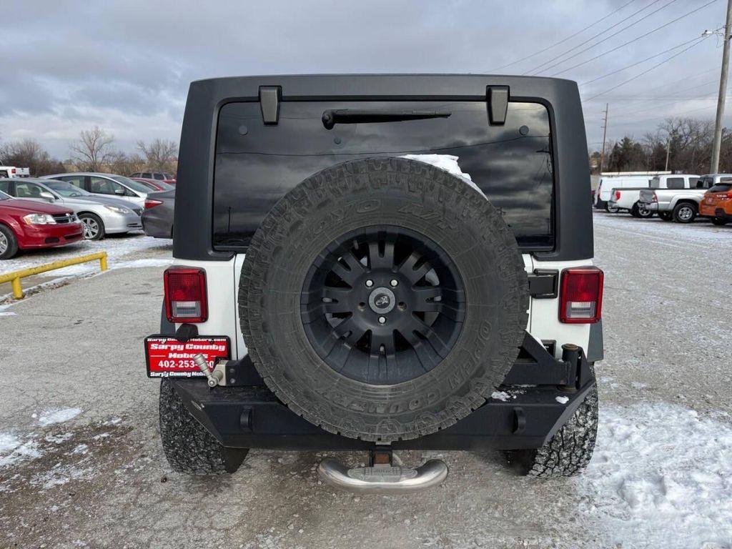 used 2014 Jeep Wrangler Unlimited car, priced at $16,933