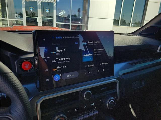 used 2025 Toyota Tacoma car, priced at $49,499