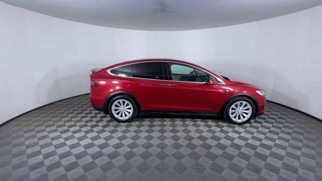 used 2018 Tesla Model X car, priced at $23,950