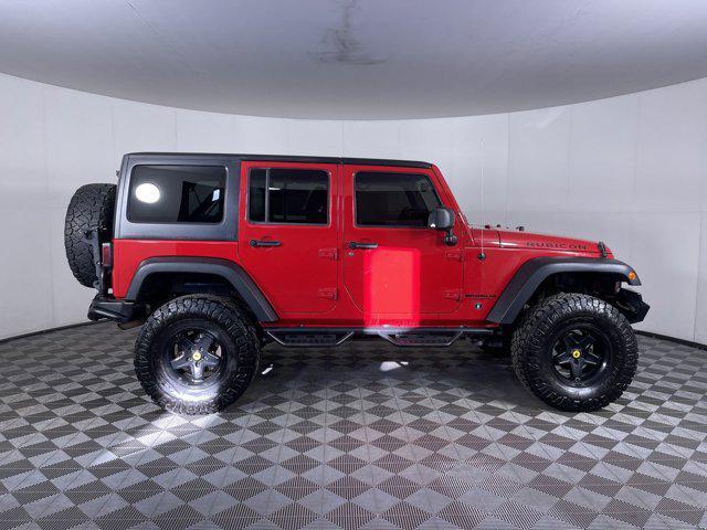 used 2014 Jeep Wrangler Unlimited car, priced at $20,954