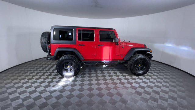 used 2014 Jeep Wrangler Unlimited car, priced at $20,954