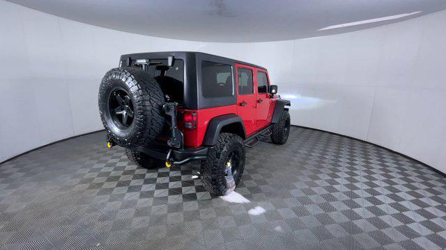 used 2014 Jeep Wrangler Unlimited car, priced at $20,954