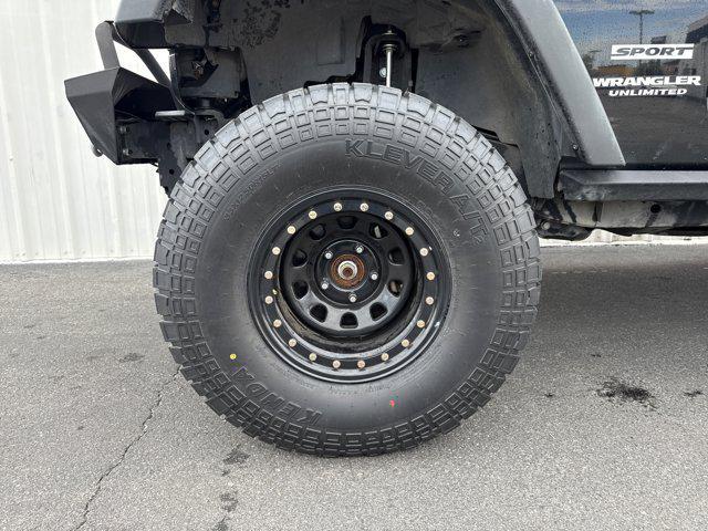 used 2014 Jeep Wrangler Unlimited car, priced at $17,491