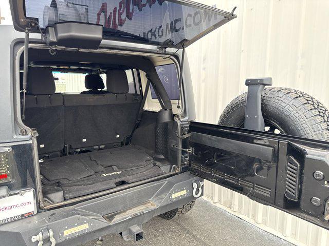 used 2014 Jeep Wrangler Unlimited car, priced at $17,491