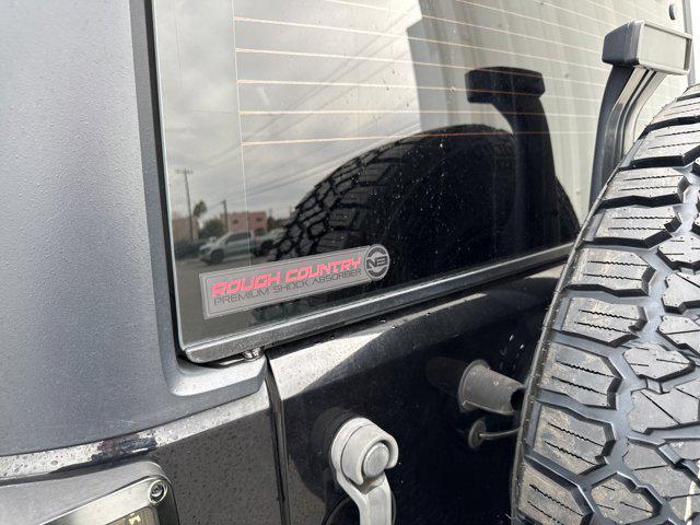 used 2014 Jeep Wrangler Unlimited car, priced at $17,491