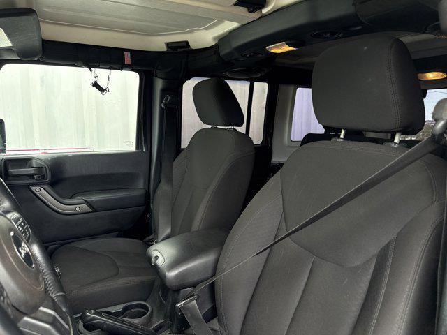 used 2014 Jeep Wrangler Unlimited car, priced at $17,491