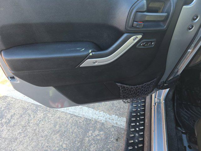 used 2015 Jeep Wrangler Unlimited car, priced at $16,493