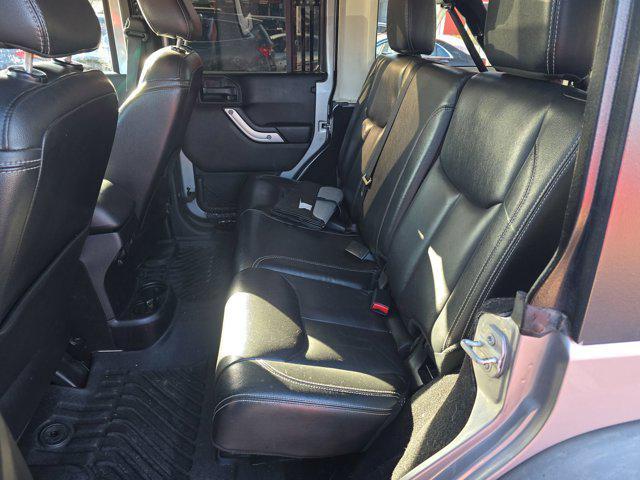 used 2015 Jeep Wrangler Unlimited car, priced at $16,493