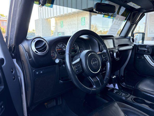 used 2015 Jeep Wrangler Unlimited car, priced at $15,491