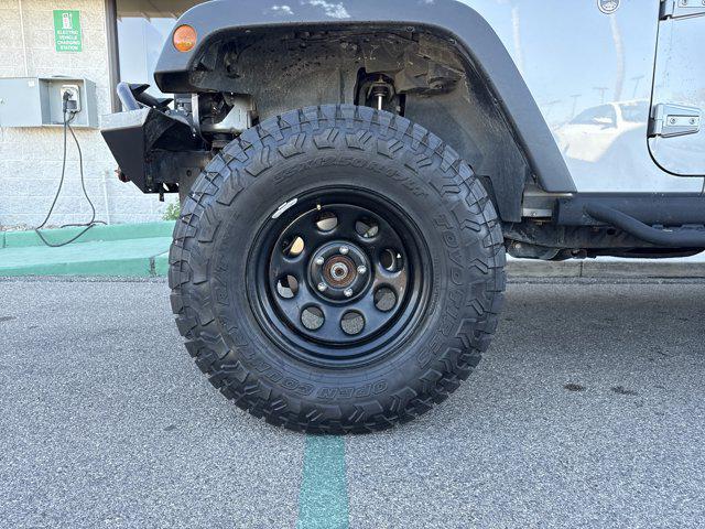 used 2015 Jeep Wrangler Unlimited car, priced at $15,491