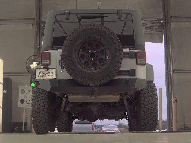used 2015 Jeep Wrangler Unlimited car, priced at $16,493