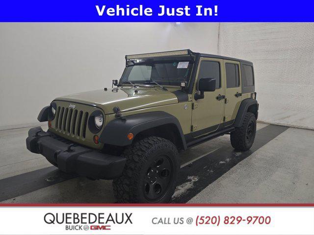 used 2013 Jeep Wrangler Unlimited car, priced at $17,498