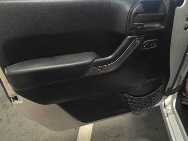 used 2012 Jeep Wrangler Unlimited car, priced at $14,493