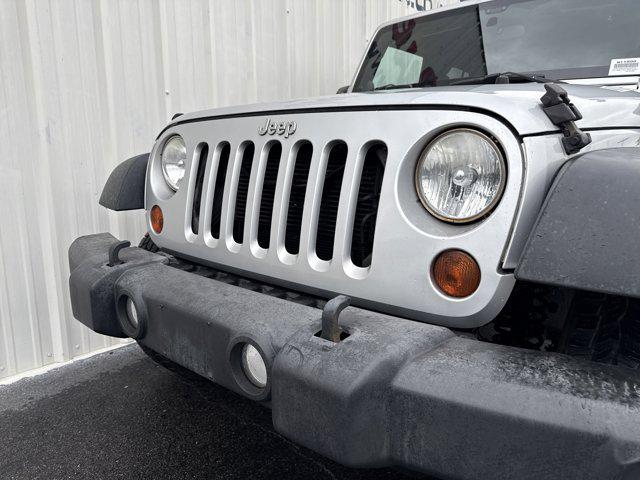 used 2012 Jeep Wrangler Unlimited car, priced at $13,491