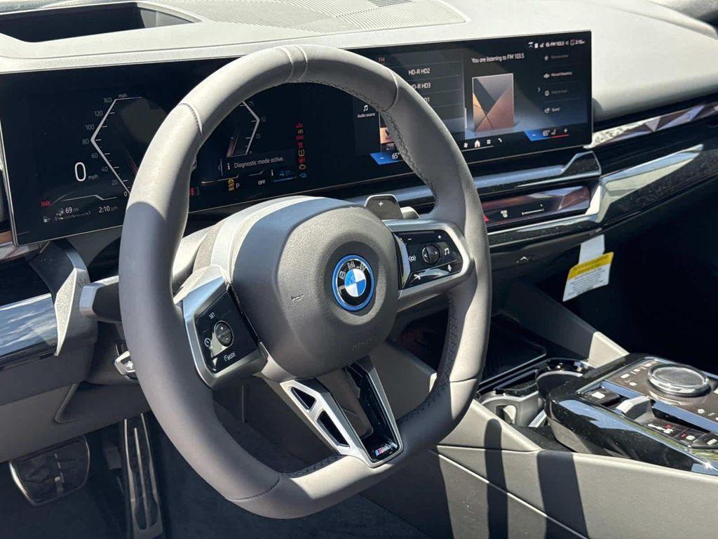 new 2026 BMW 550e car, priced at $83,364