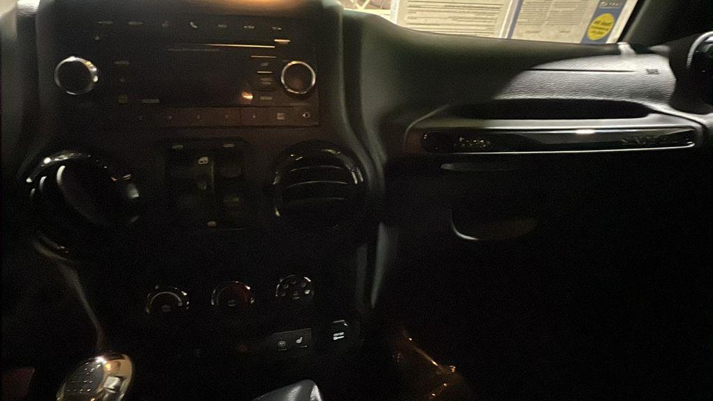 used 2015 Jeep Wrangler Unlimited car, priced at $12,995