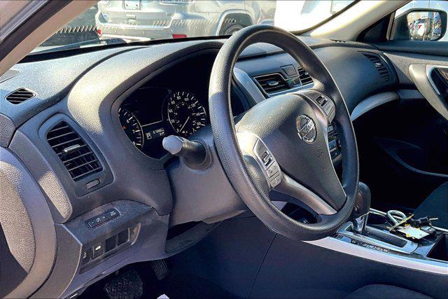 used 2014 Nissan Altima car, priced at $10,000