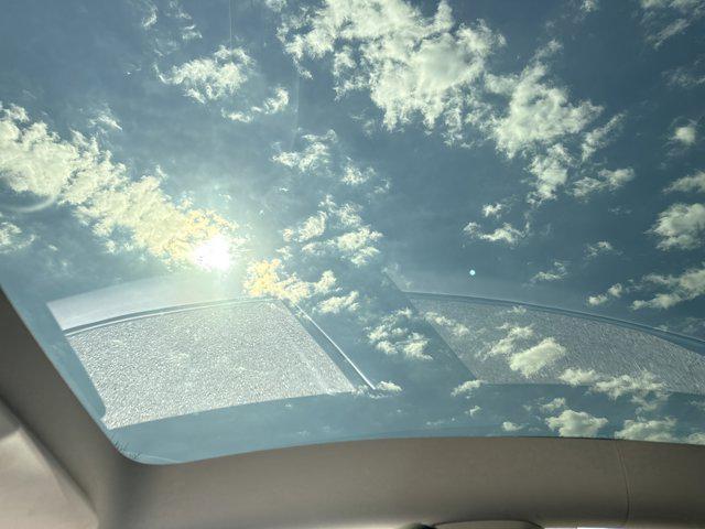 used 2024 Tesla Model Y car, priced at $33,800