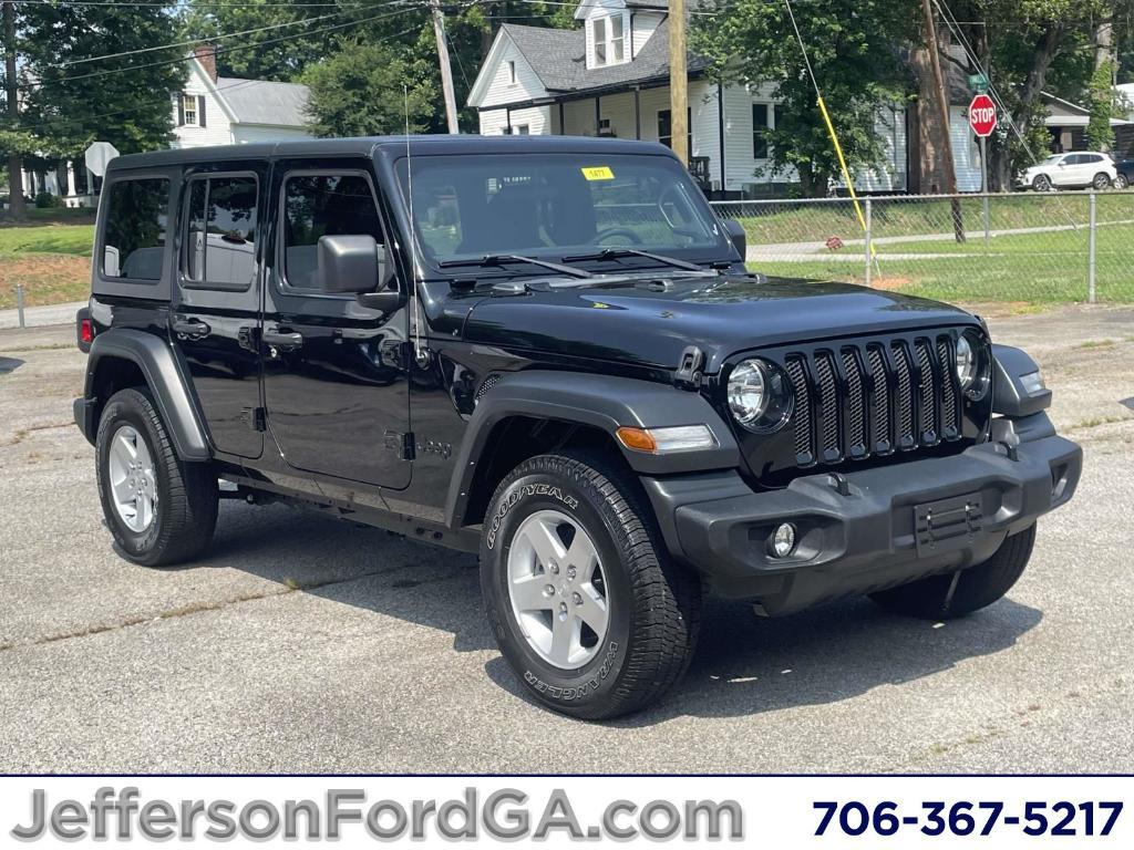 used 2023 Jeep Wrangler car, priced at $29,784