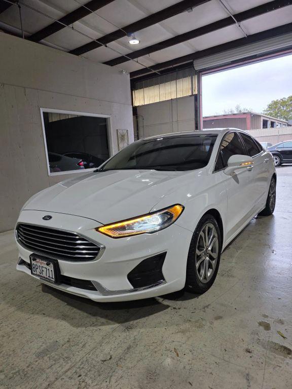 used 2019 Ford Fusion car, priced at $9,999
