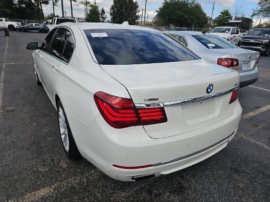 used 2013 BMW 750 car, priced at $9,900