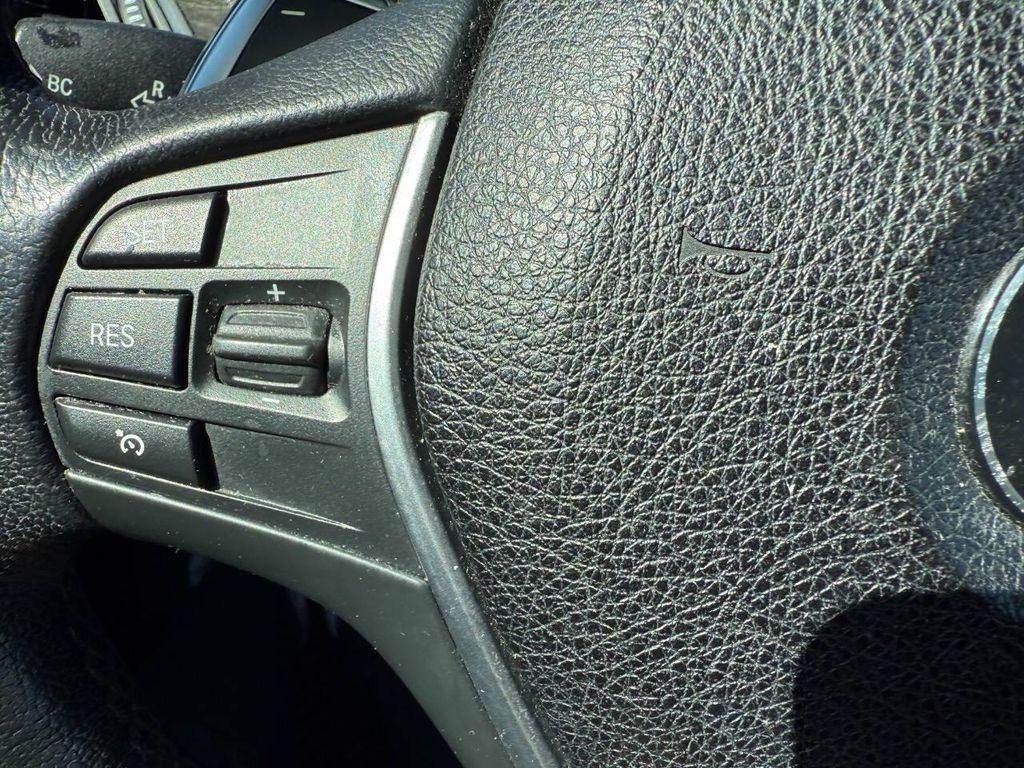 used 2015 BMW 228 car, priced at $8,999